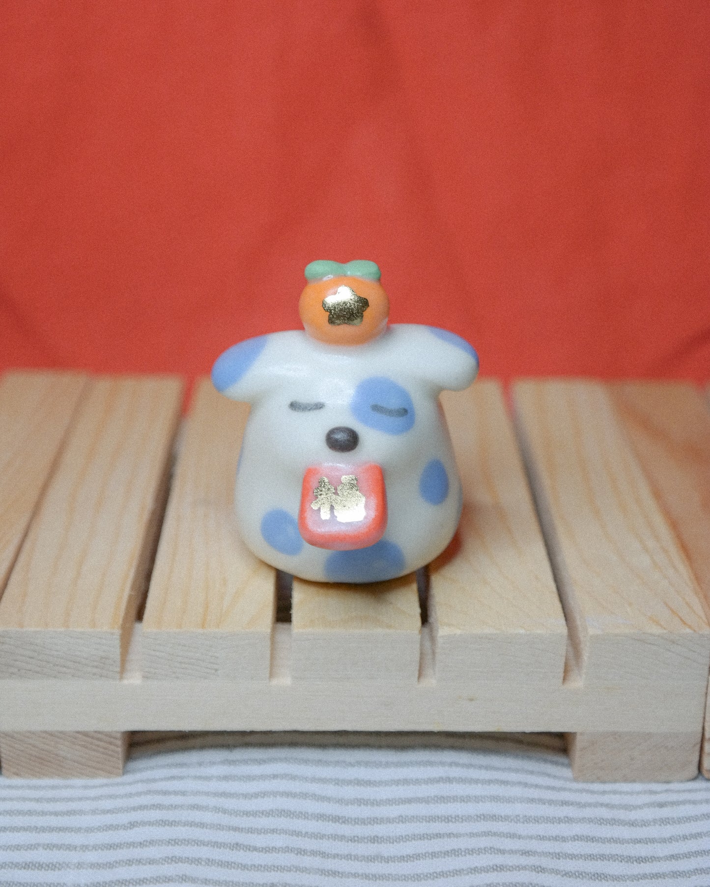 Red Envelope Dog Ceramic Figurine