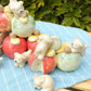 "Puppy Playground: Apple Picking" Ceramic Sculpture