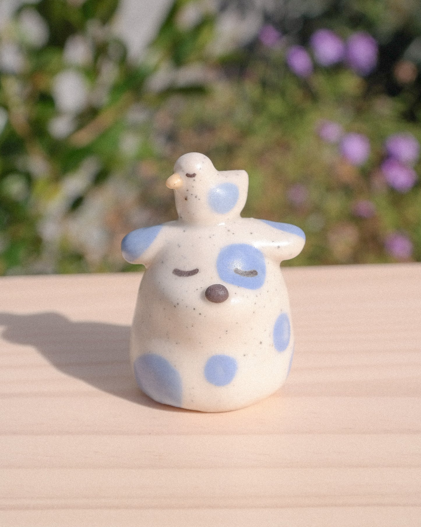 Fancy Stump Dog Ceramic Figurine