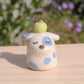 Fancy Stump Dog Ceramic Figurine