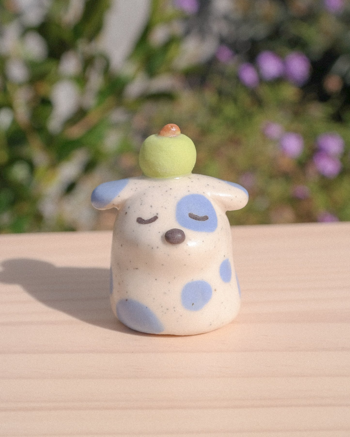 Fancy Stump Dog Ceramic Figurine