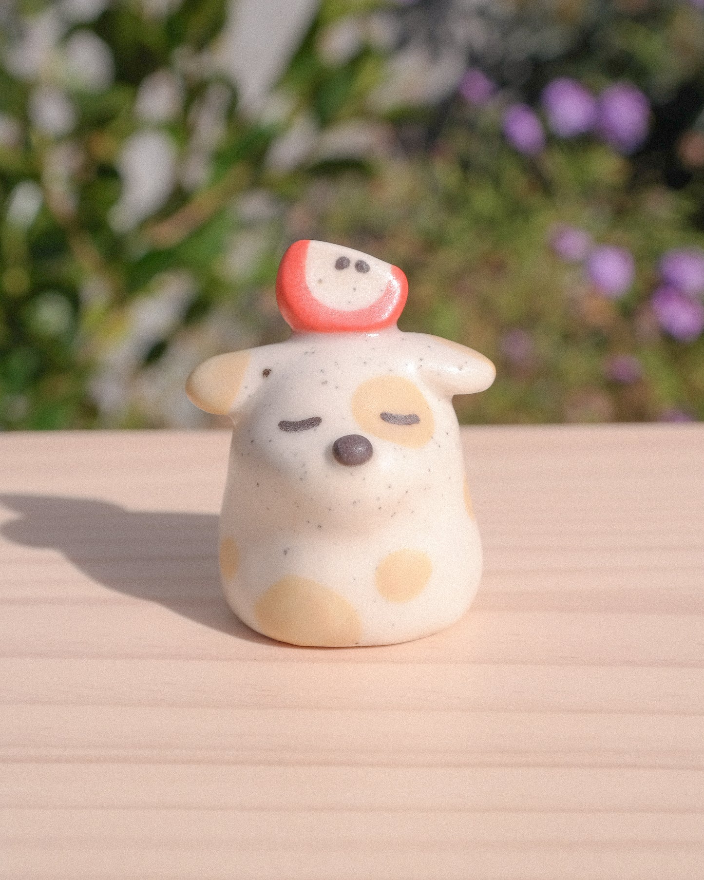 Fancy Stump Dog Ceramic Figurine
