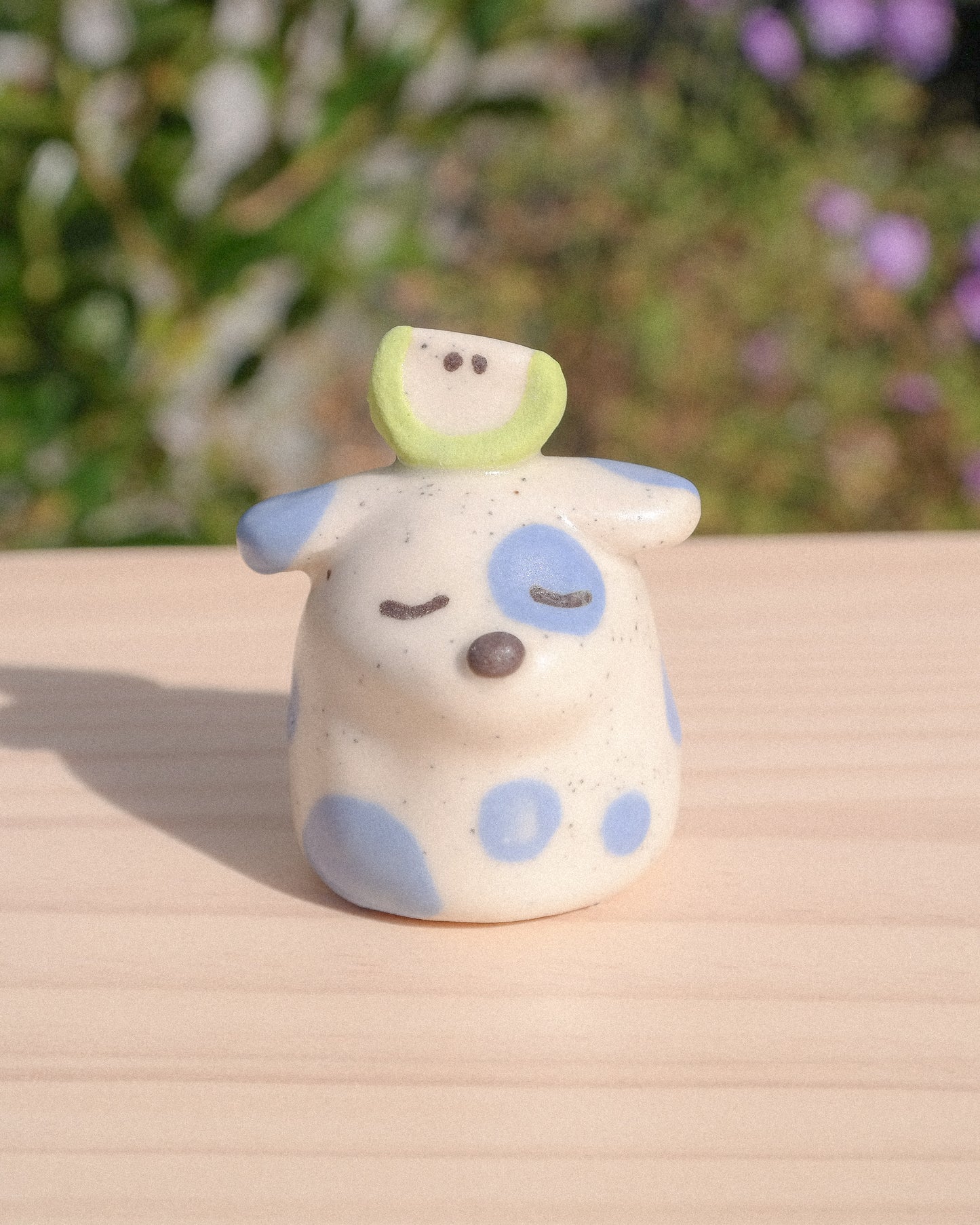 Fancy Stump Dog Ceramic Figurine