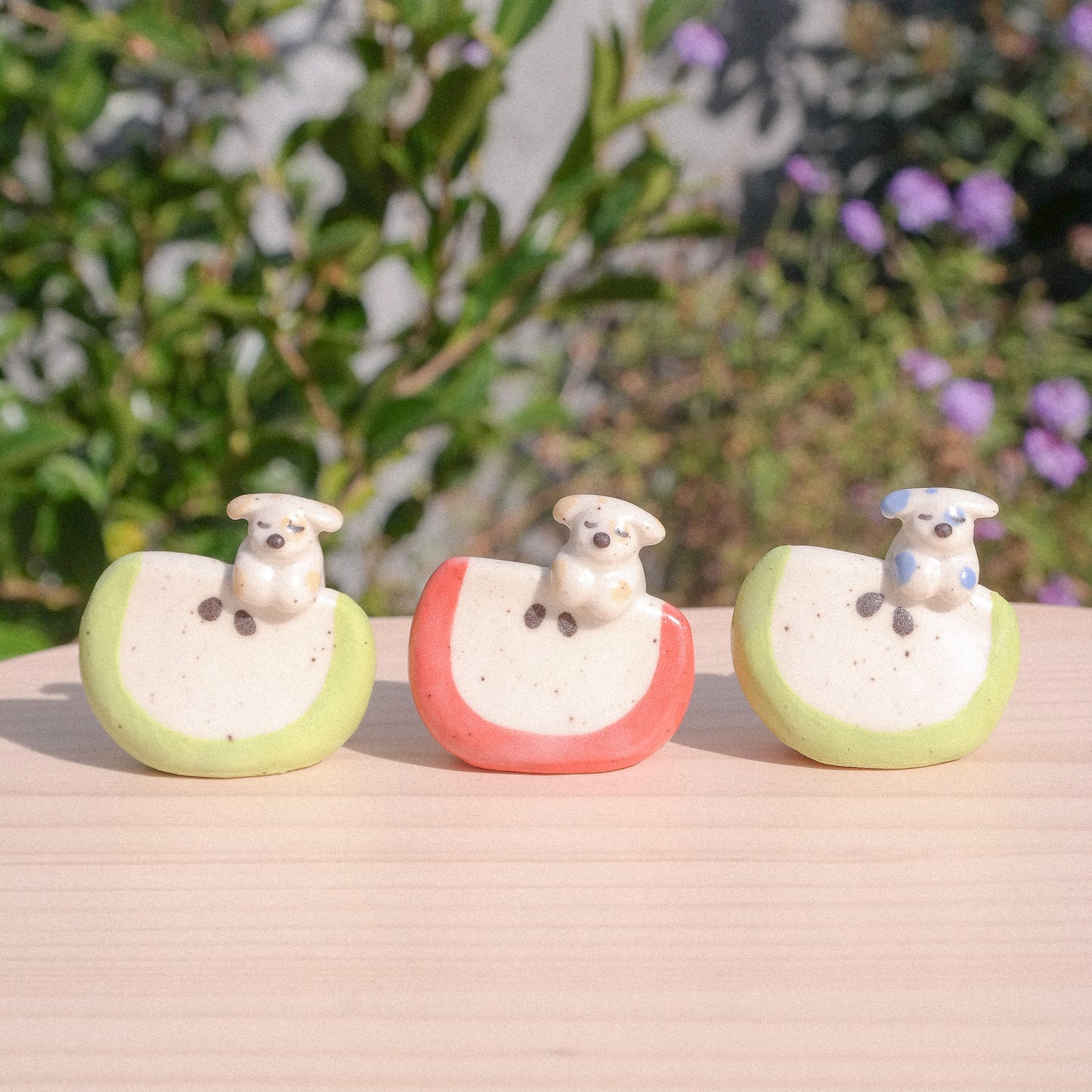 Tiny Apple Slice Dog Ceramic Figurine