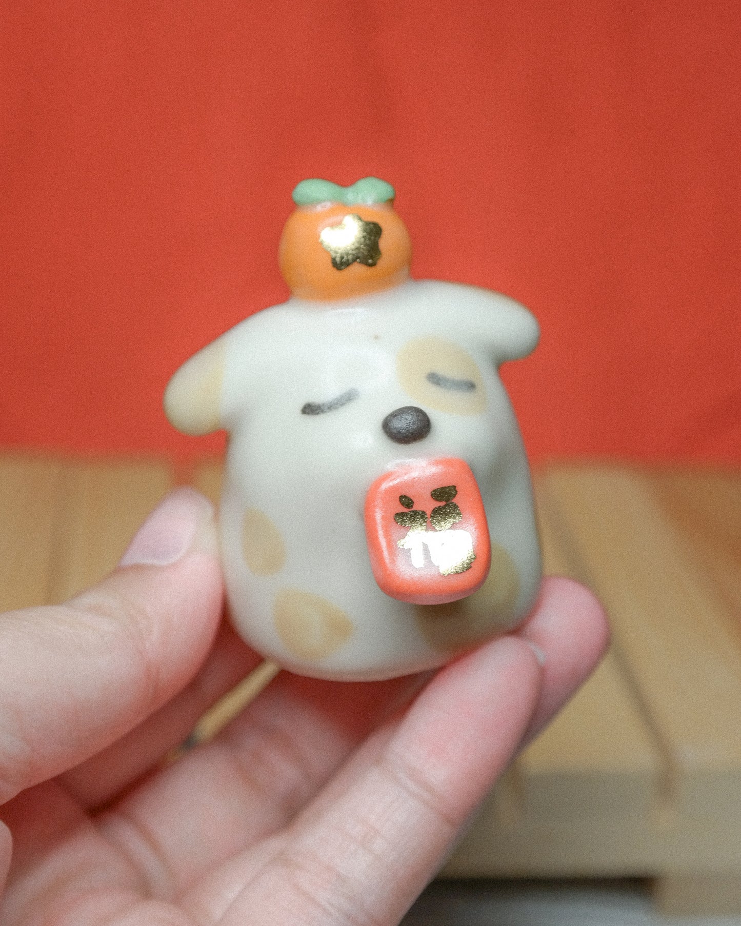 Red Envelope Dog Ceramic Figurine