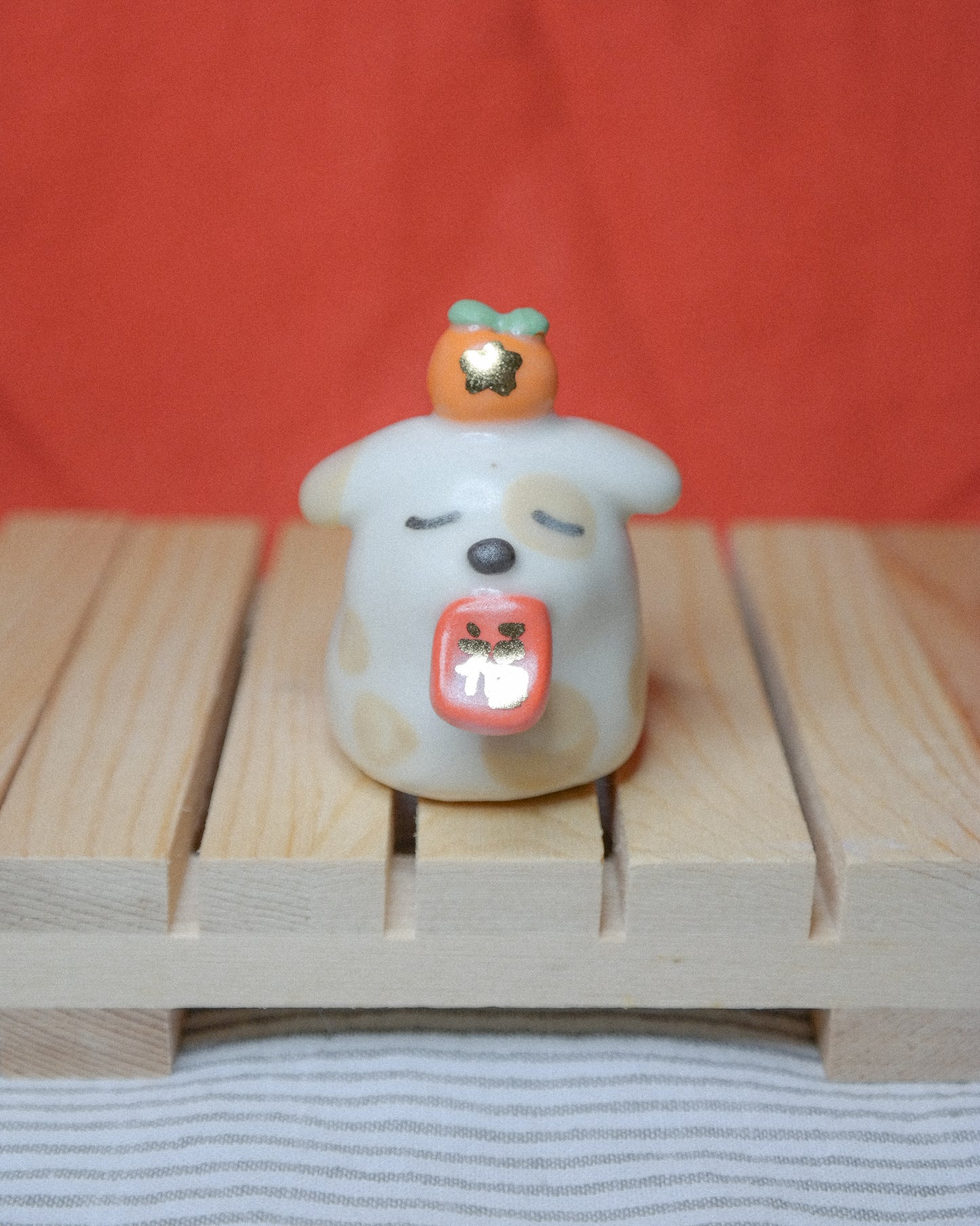 Red Envelope Dog Ceramic Figurine