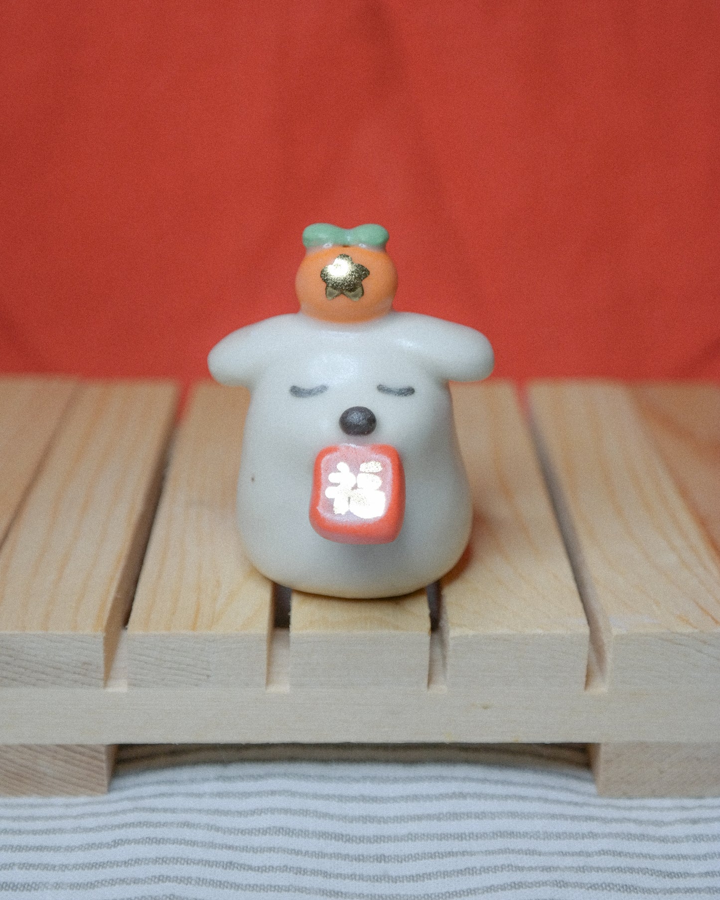 Red Envelope Dog Ceramic Figurine
